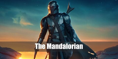  The Mandalorian’s costume is a black top, black pants, grey vest, brown armor, a black cape, a utility belt, black gloves, and a bounty hunter helmet.