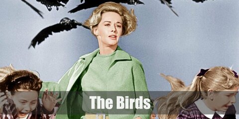  Melanie Daniels from The Birds’s costume is a light green blazer, a light green pencil skirt, light green heels, and attached to her are black crows.