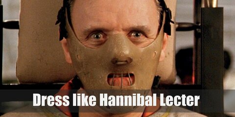 Hannibal Lector costume is wearing his orange prison uniform and is restrained by a white straight jacket. He also wears a brown mask over his mouth.  