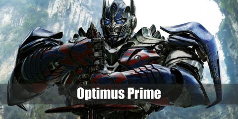  Optimus Prime’s costume is a long-sleeved red T-shirt, gray pants, a painted cardboard body, arms and legs, Optimus Prime gloves, stickers, a mask and a blaster.