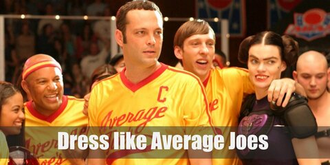 Average Joes costume is a mustard yellow shirt with ‘Average Joes’ printed on it, matching running shorts, and comfy sneakers.
