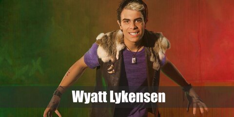 Wyatt wears a purple shirt under a vest with faux fur. He also has hair highlights and tattoos.