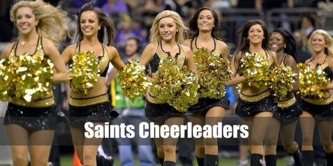 Recreate the Saints Cheerleader costume by wearing a yellow or gold top and skirt styled with the Saints logo. Then wear black boots and carry gold pompoms, too.