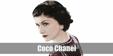 Coco Chanel’s costume is a simple long-sleeved black shirt tucked into a long blacks skirt with layers and layers of pearls around her neck. Coco Chanel is one of the most famous fashion icons in history.