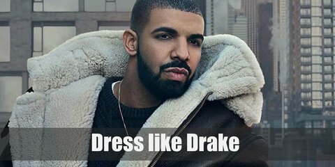 Drake costume is a plain black sweater topped with a leather jacket with fur hood, tan pants, a belt, a fashionable pair of sneakers, and a gold necklace.