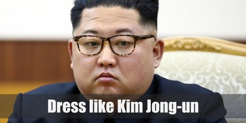 Kim Jong-un wears a white buttoned down shirt, a black Mao suit and black slack pants.