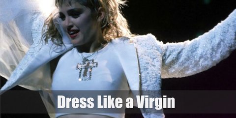  Even what Madonna wore in the Like A Virgin music video is still emulated today. She was wearing a flowy white dress with a bustier top, fingerless lace gloves, white heels, and layered necklaces.  