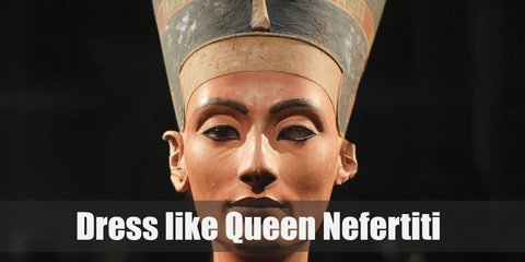 Nefertiti costume is a gold and blue dress, a gold cloak, an Egyptian headpiece, an Egyptian neck piece and earrings, golden armbands and bracelets, an Egyptian styled belt, and golden high heels.