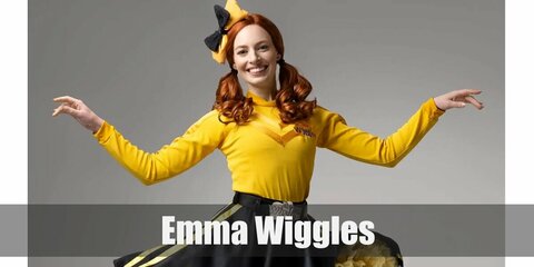 Emma Wiggle's costume features a yellow sweater, a yellow skirt, and a black skirt on top of the yellow one. She also has black tights and shoes and tops her look with a yellow-and-black ribbon.