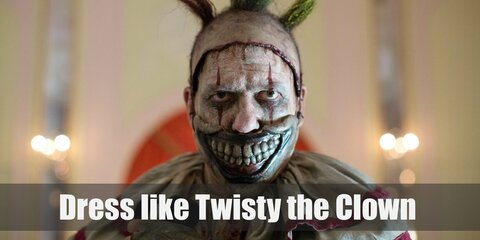  Twisty wears a dirty white clown costume. His deranged-looking prosthetic grin is a mask to hide the fact that he doesn’t have a jaw anymore.
