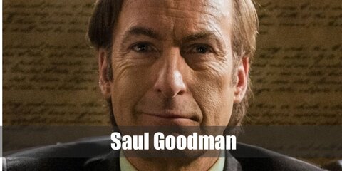  Saul Goodman’s costume is  a long-sleeved red button-down shirt, a two-piece black formal suit, black leather Oxford shoes, a red and white tie, and a bluish pocket square.
