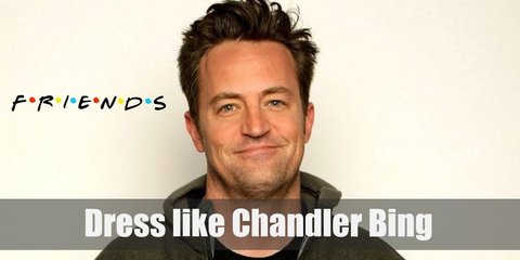 For this outfit, Chandler Bing has on a long-sleeved denim shirt, a brown vest, khaki pants, and plain white sneakers. 