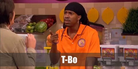 T-Bo is known for his orange shirt and black pants attire. He also has his hair in dreadlocks. Complete the costume with a stick and some donuts.
