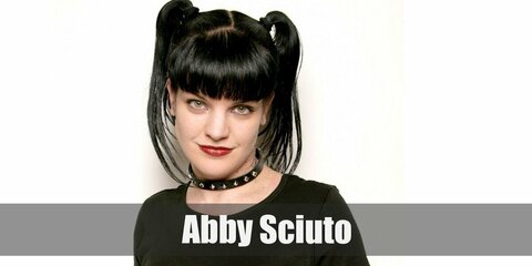 Abby Sciuto’s costume is a black top, black skirt, black boots, black lipstick, and a white doctor’s coat. Abby Sciuto is probably the happiest goth you’ll ever meet.