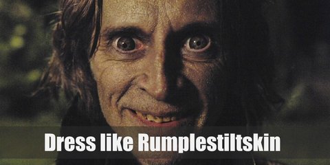 Rumpelstiltskin costume is a red Gothic vest topped with a reddish jacket, brown pirate pants, brown gauntlets, and brown leather boots.