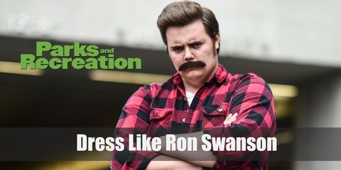 Ron Swanson regular outfits also embody his masculine no-nonsense personality as well. You’ll see him mostly in slacks and a smart polo shirt.