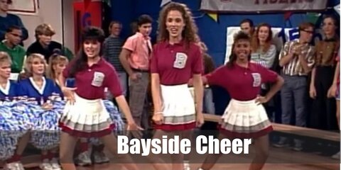  Bayside Cheerleader (Saved by the Bell)’s costume is a Bayside High School cheerleading uniform, white slouch socks, and white cheerleading shoes.