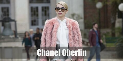 Chanel’s costume is a white pussy bow blouse, a black and white mini pencil skirt, a pink fur jacket, pink knee-high socks, white heels, black round sunglasses, and a pink mini-tote. Chanel may be mean and manipulative but she is 100% a style queen.