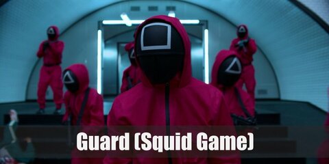 The Guard's costume from Squid Game can be worn with an all-pink suit or wear a pink hoodie and matching pants. Style it with a black belt, gloves, and shoes. Complete the costume with a black mask that has a circle, square, or triangle shape.
