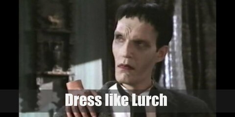 Lurch costume is a white buttoned down shirt topped with a black suit jacket, black working pants, black leather shoes, and a black bow tie. 