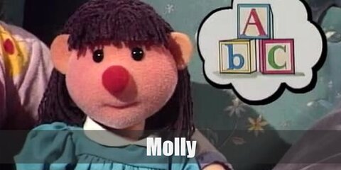 Molly wears a blue dress with collar, black, shoes, and a ribbon on her hair.