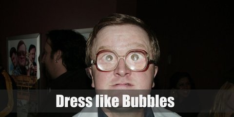 Bubbles costume is big, googly glasses, a plaid, button-down shirt and khaki pants.